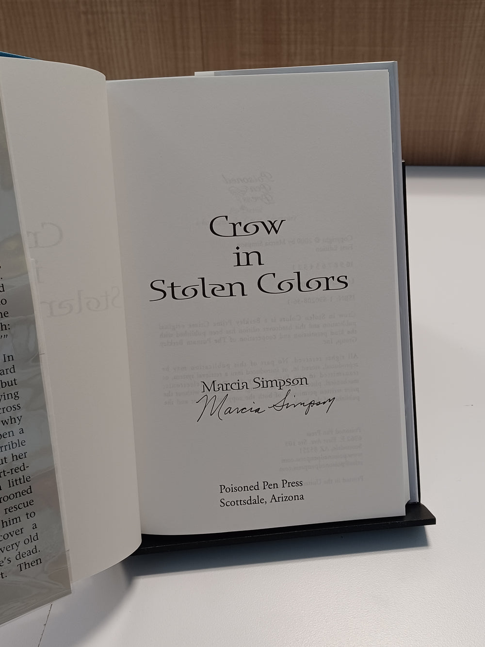 Crow in Stolen Colors
 by Marcia Simpson